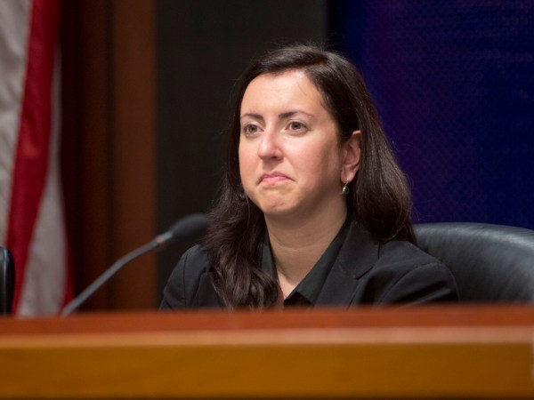 Assemblywoman Nily Rozic, D-Fresh Meadows, listens to a speaker during an Assembly oversight hearing on the state prison system on Wednesday, Dec. 2, 2015, in Albany, N.Y. (AP Photo/Mike Groll)