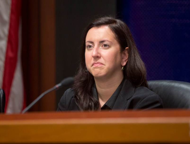 Assemblywoman Nily Rozic, D-Fresh Meadows, listens to a speaker during an Assembly oversight hearing on the state prison system on Wednesday, Dec. 2, 2015, in Albany, N.Y. (AP Photo/Mike Groll)