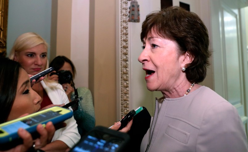 Sen. Susan Collins, R-Maine, speaks with reporters before heading into a policy luncheon, on Capitol Hill, Tuesday, Sept. 19, 2017 in Washington. (AP Photo/Alex Brandon)
