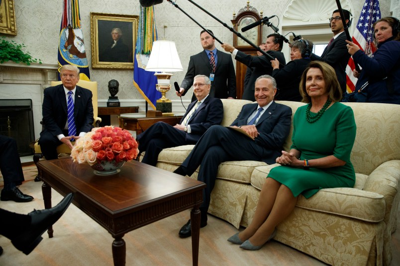 President Donald Trump meets with, from left, Senate Majority Leader Mitch McConnell, R-Ky., Senate Minority Leader Chuck Schumer, D-N.Y., and House Minority Leader Nancy Pelosi, D-Calif., and other Congressional leaders in the Oval Office of the White House, Wednesday, Sept. 6, 2017, in Washington. (AP Photo/Evan Vucci)