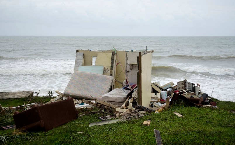 A completely ruined house is seen in El Negro community a day after the impact of Maria, a Category 5 hurricane crossed the  island, in Yabucoa, Puerto Rico, Thursday, September 21, 2017. (AP Photo/Carlos Giusti)