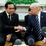 President Donald Trump shakes hands with Thai Prime Minister Prayut Chan-ocha during a meeting in the Oval Office of the White House, Monday, Oct. 2, 2017, in Washington. (AP Photo/Evan Vucci)