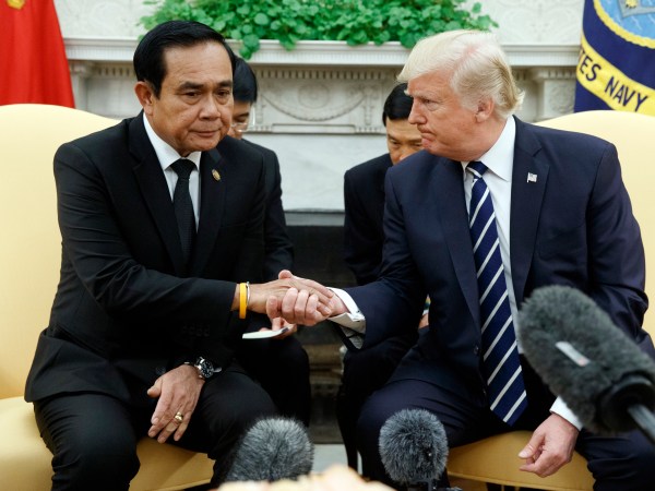 President Donald Trump shakes hands with Thai Prime Minister Prayut Chan-ocha during a meeting in the Oval Office of the White House, Monday, Oct. 2, 2017, in Washington. (AP Photo/Evan Vucci)