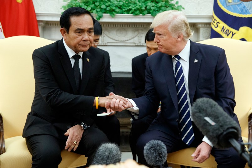 President Donald Trump shakes hands with Thai Prime Minister Prayut Chan-ocha during a meeting in the Oval Office of the White House, Monday, Oct. 2, 2017, in Washington. (AP Photo/Evan Vucci)