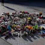 A man pauses at a memorial for the victims of a mass shooting in Las Vegas, Wednesday, Oct. 4, 2017, in Las Vegas. (AP Photo/Marcio Jose Sanchez)