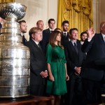 President Donald Trump stands with the 2017 NHL Stanley Cup Champions Pittsburgh Penguins in the East Room of the House in Washington, Tuesday, Oct. 10, 2017. (AP Photo/Susan Walsh)