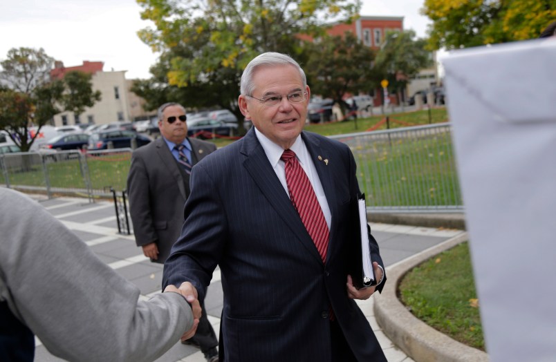 New Jersey Senator Robert Menendez greets supporters as he arrives to court in Newark, N.J., Monday, Oct. 16, 2017. The judge in Menendez's corruption trial could rule on Monday to dismiss the bulk of the indictment against the New Jersey Democrat, a decision that prosecutors say could "broadly legalize pay-to-play politics." (AP Photo/Seth Wenig)