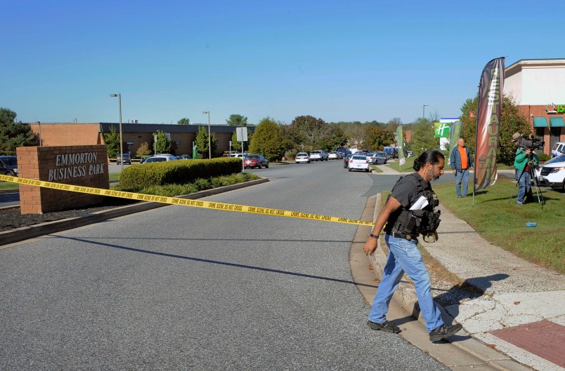 Edgewood, Md.--10/18/17-- Police officer put up crime scene tape at the scene of shooting at Emmorton Business Park. Harford County Sheriff Jeffrey Gahler holds news conference near the scene of a workplace shooting where five people are shot and three are confirmed dead. The shooting is at the Advanced Granite Solutions inside Emmorton Business Park.Kenneth K. Lam/The Baltimore Sun md-harford county-shooting Lam