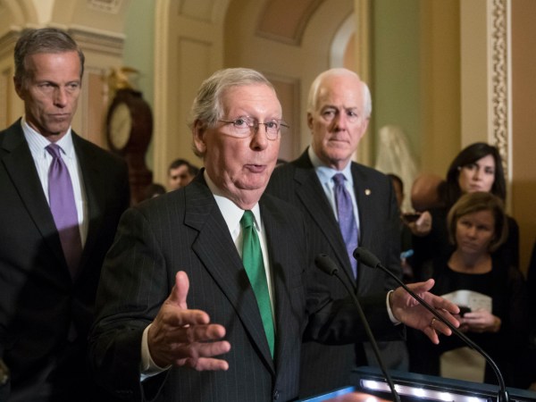 Senate Majority Leader Mitch McConnell, R-Ky., flanked by Sen. John Thune, R-S.D., left, and Majority Whip John Cornyn, R-Texas, announces to reporters that the Senate is moving ahead on a Republican budget plan, a critical step in President Donald Trump and the party's politically imperative drive to cut taxes and simplify the IRS code, at the Capitol in Washington, Tuesday, Oct. 17, 2017.  (AP Photo/J. Scott Applewhite)