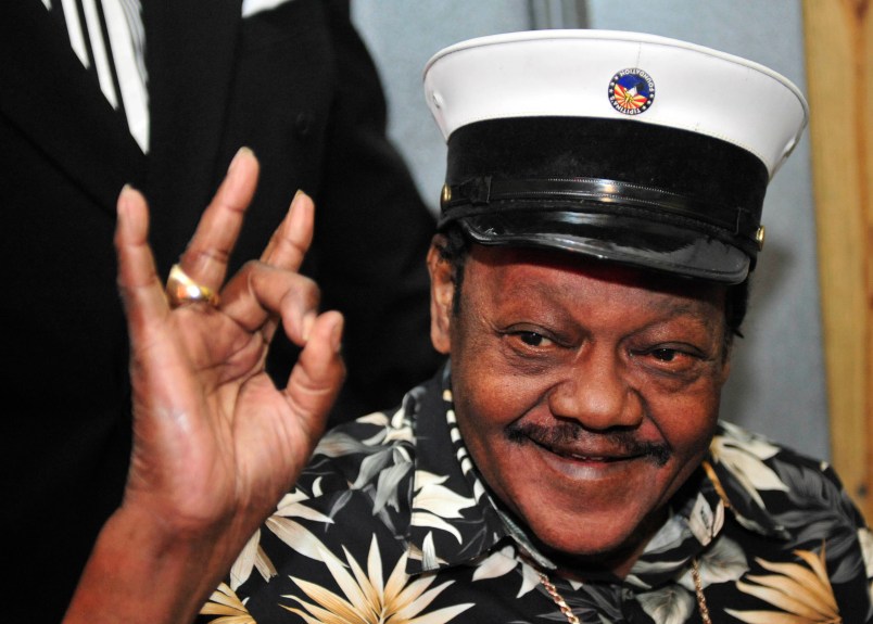 Recording artist Fats Domino waves to fans before a ceremony re-presenting two new Grammy awards to replace the ones that he lost from Hurricane Katrina's flooding, New Orleans, Wednesday, Nov. 5, 2008.(AP Photo/Cheryl Gerber)