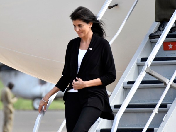 US Ambassador to the United Nations Nikki Haley, arrives in Juba, south sudan, Wednesday, Oct.25, 2017.  The U.S. ambassador to the United Nations, Nikki Haley, has been evacuated from a U.N. camp for displaced people in South Sudan because of a volatile demonstration against President Salva Kiir. An aid worker at the camp says U.N. security guards fired tear gas to disperse the crowd of more than 100 people shortly after Haley left. The ambassador, on a three-country Africa visit, met earlier with Kiir over the country's long civil war. (AP Photo)