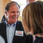 Candidate Doug Jones chats with constituents before a Democratic Senate candidate forum at the Princess Theatre in Decatur, Ala. Thursday, Aug. 3, 2017. (Jeronimo Nisa /The Decatur Daily via AP)