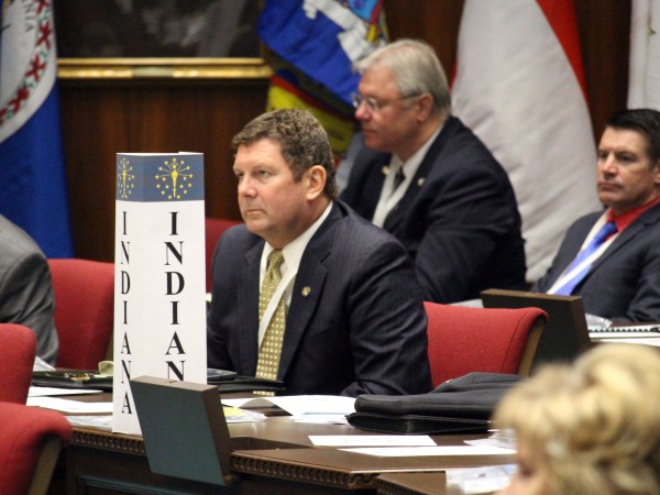 Indiana Rep. Jim Lucas listens to opening remarks at a balanced budget planning convention at the Arizona Capitol in Phoenix on Sept. 12, 2017. Lawmakers from 19 states are trying to develop a plan in Arizona this week for carrying out a growing, but unlikely, national effort to amend the Constitution to require a balanced U.S. budget. The plan is to add an amendment through a convention, a long-shot effort that has never been successfully done. (AP Photo/Bob Christie)