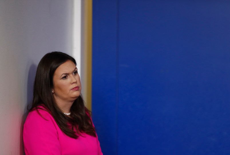 White House press secretary Sarah Huckabee Sanders stands off to the side during a news briefing at the White House, in Washington, Friday, Sept. 15, 2017. (AP Photo/Carolyn Kaster)