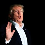 President Donald Trump speaks to reporters about Puerto Rico upon his return to the White House in Washington, Sunday, Oct. 1, 2017.   (AP Photo/Manuel Balce Ceneta)