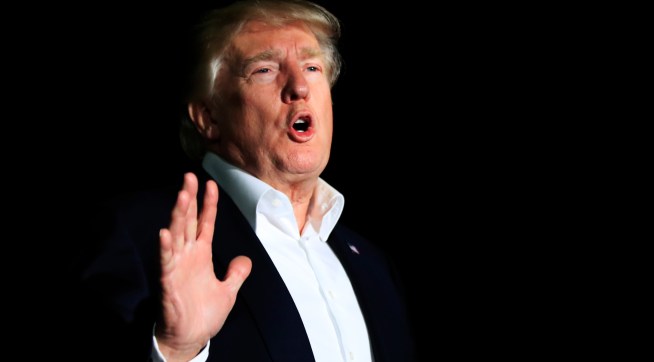 President Donald Trump speaks to reporters about Puerto Rico upon his return to the White House in Washington, Sunday, Oct. 1, 2017.   (AP Photo/Manuel Balce Ceneta)