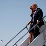 President Donald Trump and first lady Melania Trump arrive at Las Vegas McCarran International airport to meet with victims and first responders of the mass shooting, Wednesday, Oct. 4, 2017, in Las Vegas. (AP Photo/Evan Vucci)