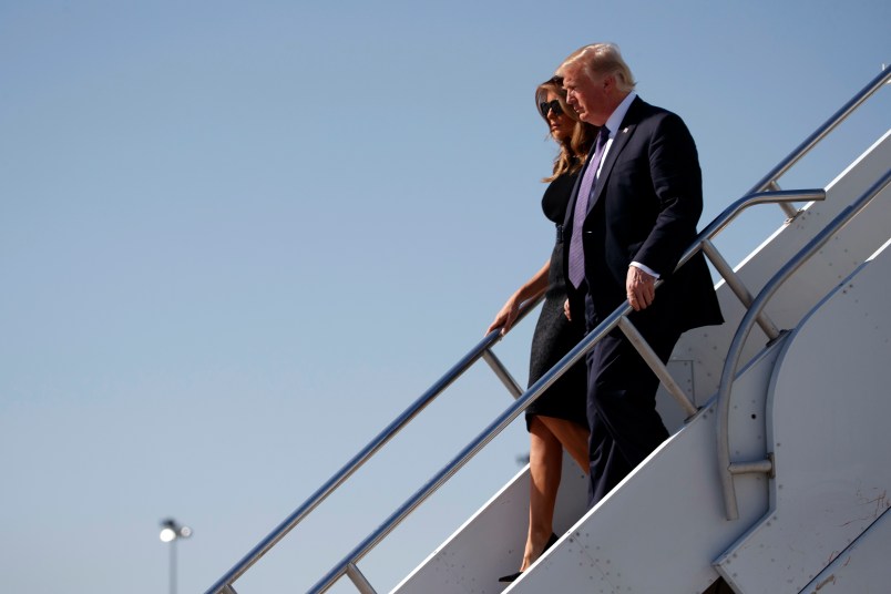 President Donald Trump and first lady Melania Trump arrive at Las Vegas McCarran International airport to meet with victims and first responders of the mass shooting, Wednesday, Oct. 4, 2017, in Las Vegas. (AP Photo/Evan Vucci)
