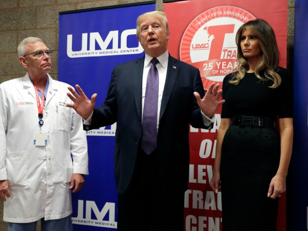 President Donald Trump and first lady Melania Trump meet with first responders and private citizens that helped during the mass shooting, Wednesday, Oct. 4, 2017, in Las Vegas. (AP Photo/Evan Vucci)