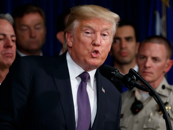President Donald Trump speaks after meeting with first responders and private citizens that helped during the mass shooting, during a "Hero's Meet and Greet" at the Las Vegas Metropolitan Police Department, Wednesday, Oct. 4, 2017, in Las Vegas. (AP Photo/Evan Vucci)