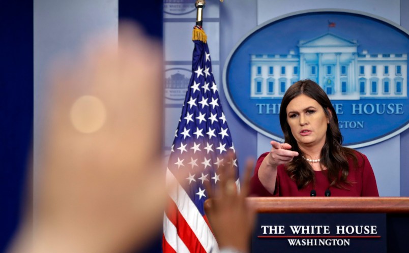 White House press secretary Sarah Huckabee Sanders points as she begins to take questions from the media during the daily briefing in the Brady Press Briefing Room of the White House, Thursday, Oct. 5, 2017. (AP Photo/Pablo Martinez Monsivais)