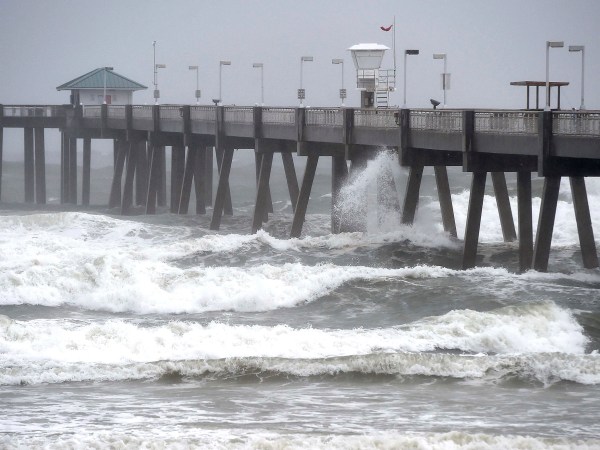 Waves caused by Hurricane Nate pound the Okaloosa Island Fishing Pier on Sunday Oct. 8, 2017 in Fort Walton Beach, Florida. (AP Photo/Northwest Florida Daily News, Nick Tomecek)
