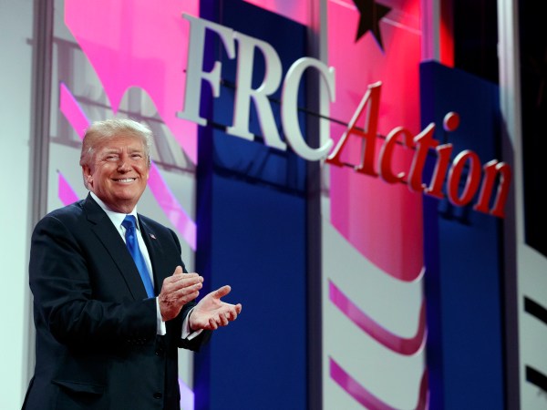President Donald Trump arrives to speak to the 2017 Value Voters Summit, Friday, Oct. 13, 2017, in Washington. (AP Photo/Evan Vucci)