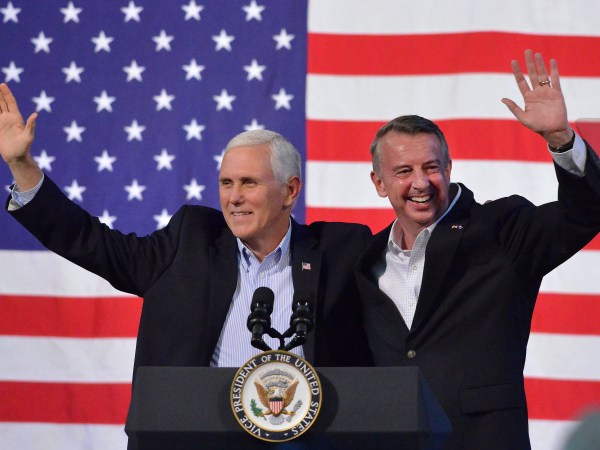 United States Vice President Mike Pence joins Virginia Republican gubernatorial candidate Ed Gillespie onstage during a party rally Saturday evening at the Washington County Fairgrounds in Abingdon. (AP Photo, Andre Teague/Bristol Herald Courier)