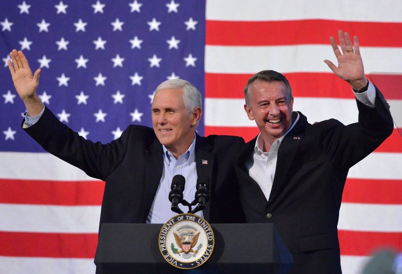 United States Vice President Mike Pence joins Virginia Republican gubernatorial candidate Ed Gillespie onstage during a party rally Saturday evening at the Washington County Fairgrounds in Abingdon. (AP Photo, Andre Teague/Bristol Herald Courier)