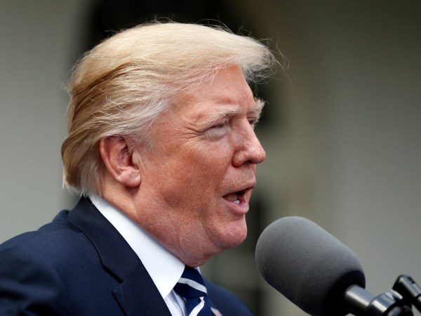 President Donald Trump speaks as he stands next Senate Majority Leader Mitch McConnell of Ky., after their meeting at the White House, Monday, Oct. 16, 2017, in Washington. (AP Photo/Alex Brandon)