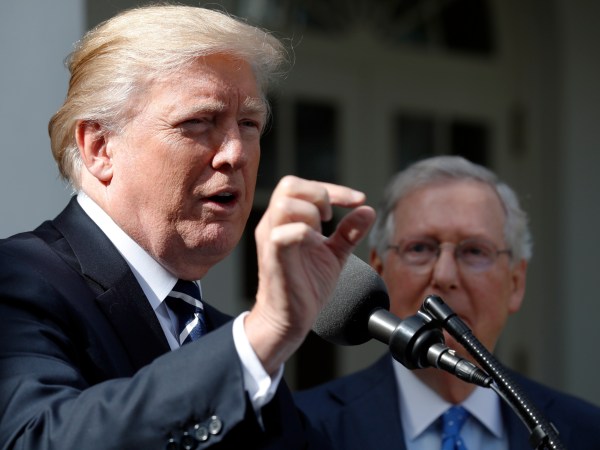 President Donald Trump speaks as he stands next Senate Majority Leader Mitch McConnell of Ky., after their meeting at the White House, Monday, Oct. 16, 2017, in Washington. (AP Photo/Alex Brandon)