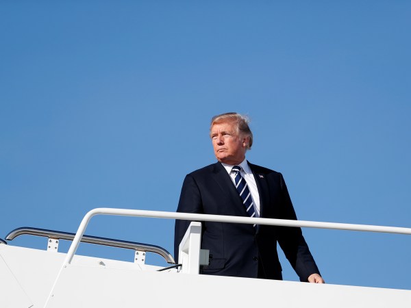 President Donald Trump boards Air Force One, Monday, Oct. 16, 2017, in Andrews Air Force Base, Md., en route Greenville, S.C., for a fundraiser for South Carolina Gov. Henry McMaster. (AP Photo/Carolyn Kaster)