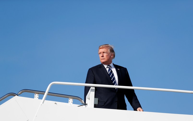 President Donald Trump boards Air Force One, Monday, Oct. 16, 2017, in Andrews Air Force Base, Md., en route Greenville, S.C., for a fundraiser for South Carolina Gov. Henry McMaster. (AP Photo/Carolyn Kaster)