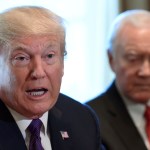President Donald Trump, left, sitting next to Senate Finance Committee Chairman Sen. Orrin Hatch, R-Utah, right, speaks during a meeting of the committee and members of the President's economic team in the Cabinet Room of the White House in Washington, Wednesday, Oct. 18, 2017. (AP Photo/Susan Walsh)