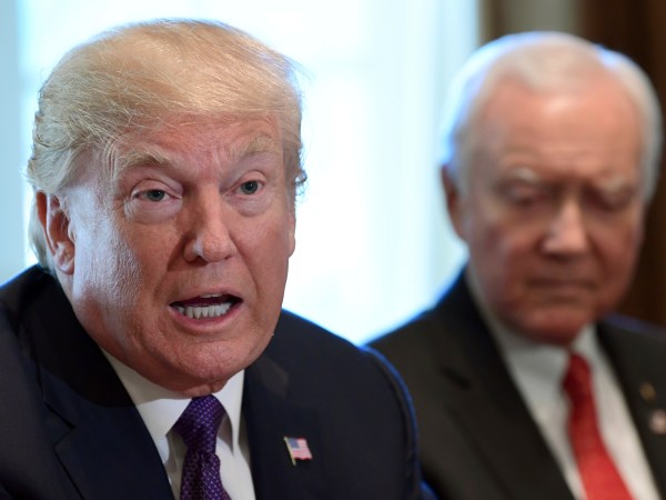 President Donald Trump, left, sitting next to Senate Finance Committee Chairman Sen. Orrin Hatch, R-Utah, right, speaks during a meeting of the committee and members of the President's economic team in the Cabinet Room of the White House in Washington, Wednesday, Oct. 18, 2017. (AP Photo/Susan Walsh)