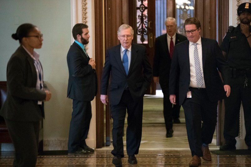 Senate Majority Leader Mitch McConnell, R-Ky., walks from the chamber to his office during a long series of votes at the Capitol in Washington, Thursday, Oct. 19, 2017. (AP Photo/J. Scott Applewhite)