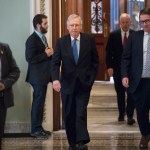 Senate Majority Leader Mitch McConnell, R-Ky., walks from the chamber to his office during a long series of votes at the Capitol in Washington, Thursday, Oct. 19, 2017. (AP Photo/J. Scott Applewhite)