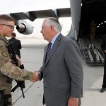 Secretary of State Rex Tillerson greets a U.S. Air Force security forces airman, before he departs, Monday, Oct. 23, 2017, at Bagram Air Field, Afghanistan. (AP Photo/Alex Brandon, Pool)
