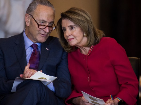 UNITED STATES - OCTOBER 25: Senate Minority Leader Charles Schumer, D-N.Y., and House Minority Leader Nancy Pelosi, D-Calif., attend a Congressional Gold Medal ceremony in in Emancipation Hall to honor Filipino veterans of World War II on October 25, 2017. (Photo By Tom Williams/CQ Roll Call)