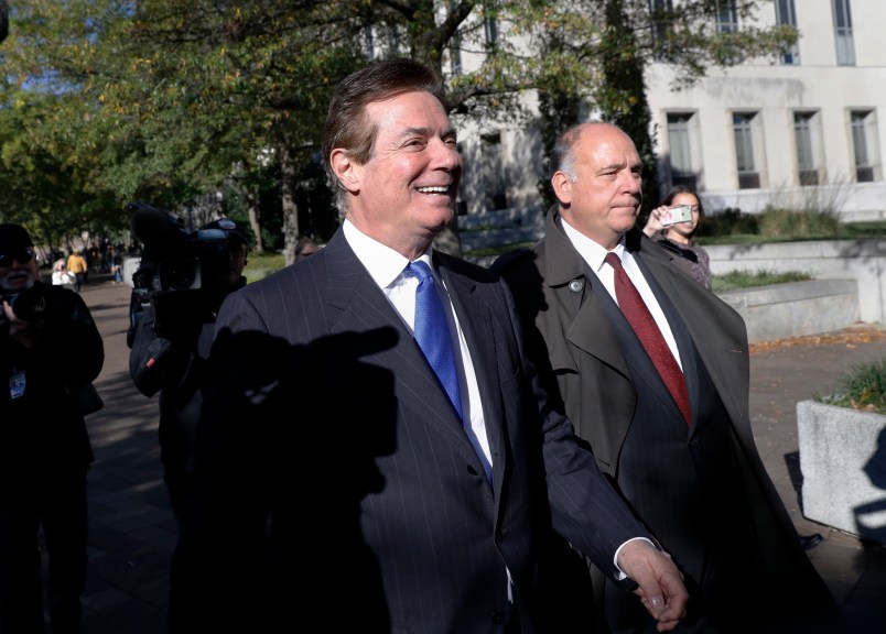 Paul Manafort, President Donald Trump's former campaign chairman, departs at Federal District Court in Washington, Monday, Oct. 30, 2017. Manafort, and a former business associate, Rick Gates, have been told to surrender to federal authorities Monday, according to reports and a person familiar with the matter. (AP Photo/Alex Brandon)
