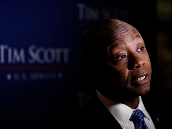 U.S. Sen. Tim Scott, R-S.C., holds a news conference after winning his Senate race against Democratic challenger Thomas A. Dixon at the North Charleston Performing Arts Center in North Charleston, S.C. Tuesday, Nov. 8, 2016. (AP Photo/Mic Smith)