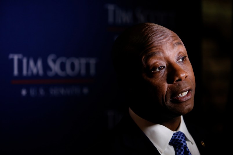 U.S. Sen. Tim Scott, R-S.C., holds a news conference after winning his Senate race against Democratic challenger Thomas A. Dixon at the North Charleston Performing Arts Center in North Charleston, S.C. Tuesday, Nov. 8, 2016. (AP Photo/Mic Smith)