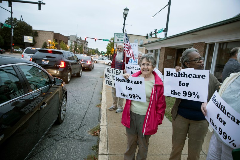 Supporters of the ACA stopped by Rep. Jackie Walorski's office to protest her support repeal and replace Wednesday, Sept. 27, 2017, in Mishawaka, Ind. (Santiago Flores/South Bend Tribune via AP)
