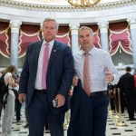 Rep. Mark Meadows, R-N.C., chairman of the conservative House Freedom Caucus, and Rep. Jim Jordan, R-Ohio, a key member of the group, walk through Statuary Hall at the Capitol in Washington, Wednesday, Sept. 13, 2017. With President Donald Trump wanting a legislative solution to replace the Deferred Action for Childhood Arrivals program, Meadows has said he will put together a working group to craft a conservative immigration plan. (AP Photo/J. Scott Applewhite)