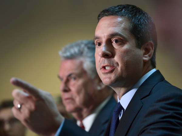 House Intelligence committee Chairman Rep. Devin Nunes, R-Calif., right, standing with Rep. Peter King, R-N.Y., left, speaks on Capitol Hill in Washington, Tuesday, Oct. 24, 2017. (AP Photo/Susan Walsh)