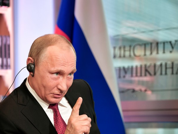 In this photo released by Sputnik news agency on Wednesday, May 31, 2017 Russian President Vladimir Putin speaks during an interview in Paris, France, Monday, May 29, 2017. In the interview with French newspaper Le Figaro released Tuesday, Putin reaffirmed his strong denial of Russia's involvement in the hacking of Democratic National Committee emails that yielded disclosures that proved embarrassing for Hillary Clinton's campaign. (Alexei Nikolsky/Sputnik, Kremlin Pool Photo via AP)