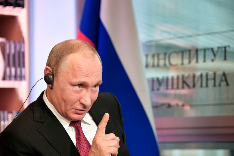 In this photo released by Sputnik news agency on Wednesday, May 31, 2017 Russian President Vladimir Putin speaks during an interview in Paris, France, Monday, May 29, 2017. In the interview with French newspaper Le Figaro released Tuesday, Putin reaffirmed his strong denial of Russia's involvement in the hacking of Democratic National Committee emails that yielded disclosures that proved embarrassing for Hillary Clinton's campaign. (Alexei Nikolsky/Sputnik, Kremlin Pool Photo via AP)