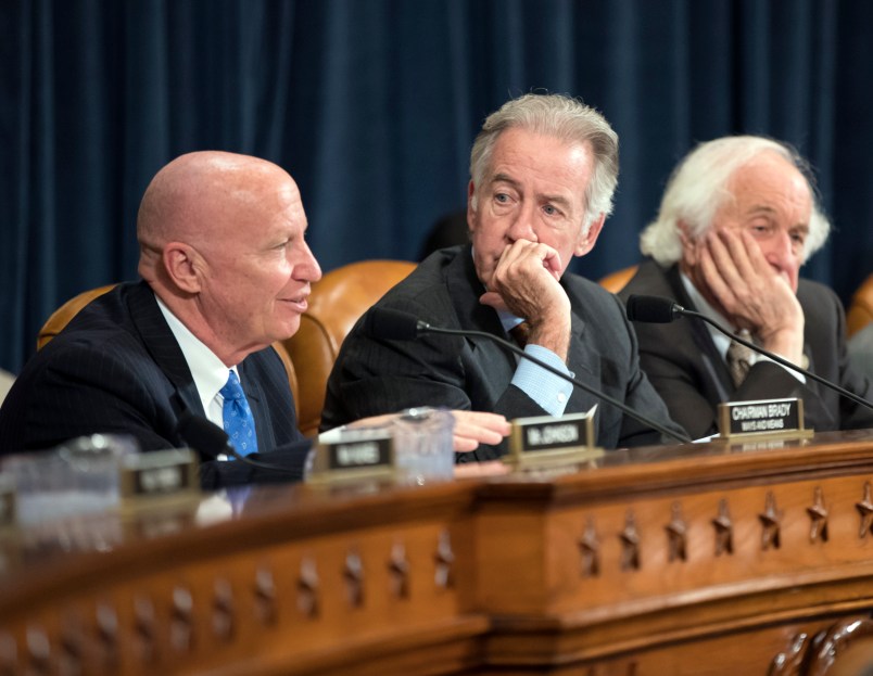 House Ways and Means Committee Chairman Kevin Brady, R-Texas, left, joined by Rep. Richard Neal, D-Mass., the ranking member, and Rep. Sander Levin, D-Mich., offers his manager's amendment as the GOP tax bill debate enters the final stage, on Capitol Hill in Washington, Thursday, Nov. 9, 2017.  (AP Photo/J. Scott Applewhite)