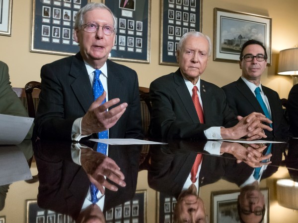 From left, Senate Judiciary Committee Chairman Chuck Grassley, R-Iowa, Senate Majority Leader Mitch McConnell, R-Ky., Senate Finance Committee Chairman Orrin Hatch, R-Utah, and Treasury Secretary Steven Mnuchin, make statements to reporters as work gets underway on the Senate's version of the GOP tax reform bill, on Capitol Hill in Washington, Thursday, Nov. 9, 2017.  (AP Photo/J. Scott Applewhite)