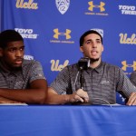 Flanked by teammates Cody Riley, left, and Jalen Hill, UCLA basketball player LiAngelo Ball reads his statement during a news conference at UCLA Wednesday, Nov. 15, 2017, in Los Angeles. The three players were detained in Hangzhou following allegations of shoplifting last week before a game against Georgia Tech in Shanghai. (AP Photo/Jae C. Hong)